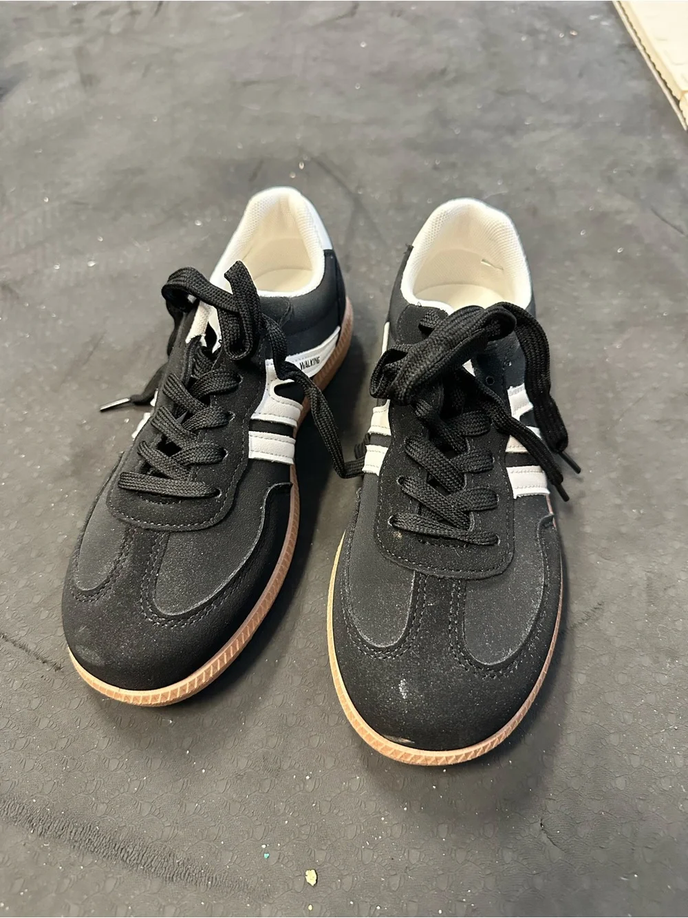 Women’s Black and White casual walking shoes with brown rubber sole